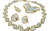 Biwaperlen Garnitur bestehend aus 0,64ct Diamanten und barocken Perlen-Kollier, Kettengleiter Ohrclips und Anhänger in 14 kt Ge, für Vergrösserung bitte hier klicken!